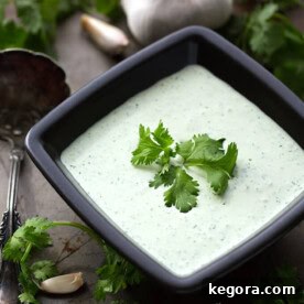 Zesty Cilantro Cream 4 Cilantro Cream Dressing in small square black bowl garnished with cilantro
