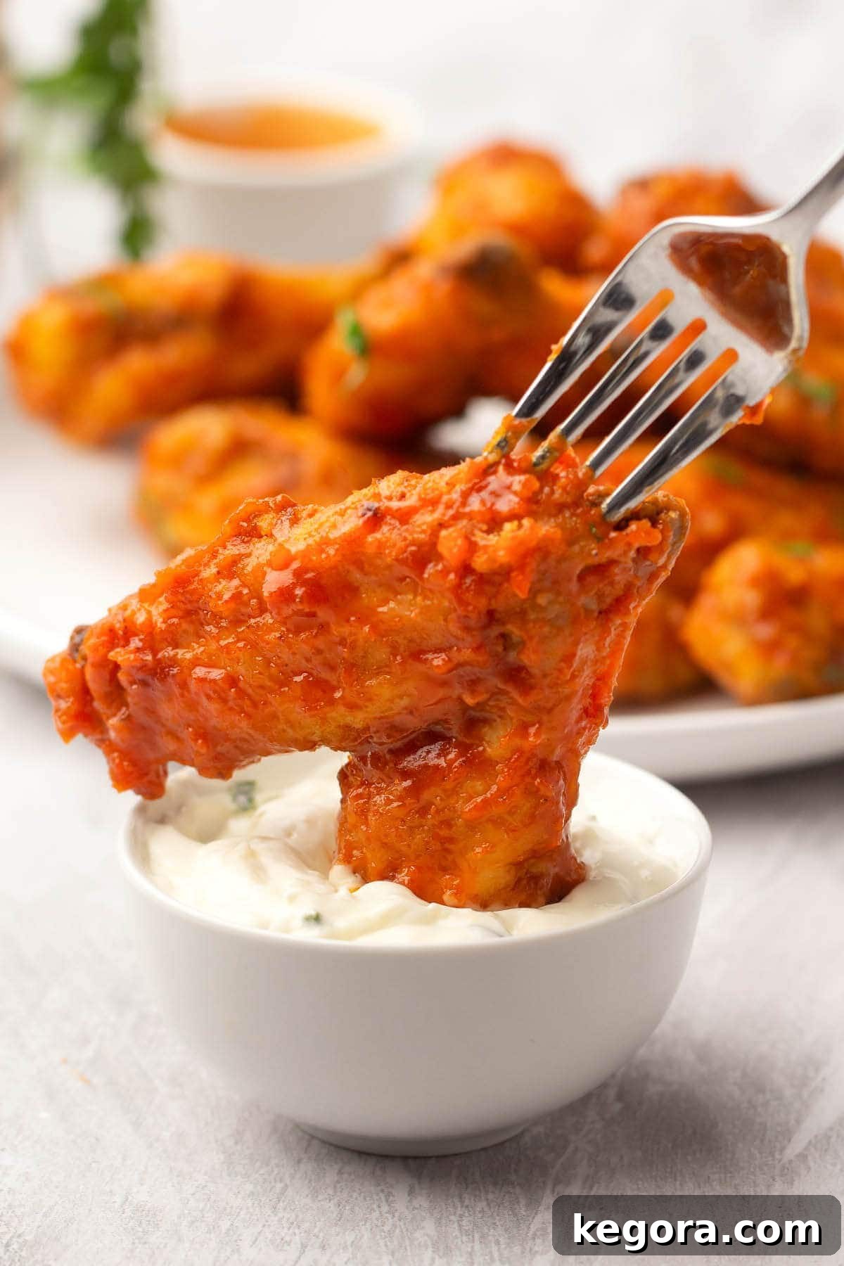 Crispy Air Fryer Buffalo Wings 12 A crispy Air Fryer Buffalo Chicken Wing, perfectly dipped in sauce.