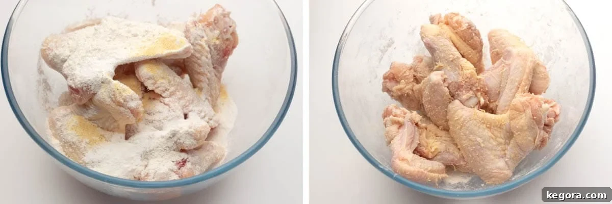 Crispy Air Fryer Buffalo Wings 5 Chicken wings in a bowl with flour, then mixed with flour to ensure even coating.