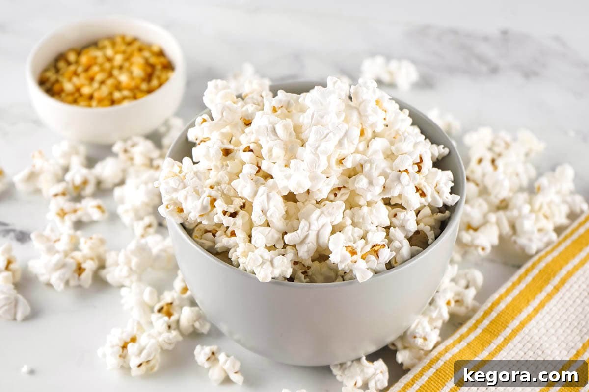 Popcorn Perfection in the Instant Pot 7 Instant Pot Popcorn in a grey bowl
