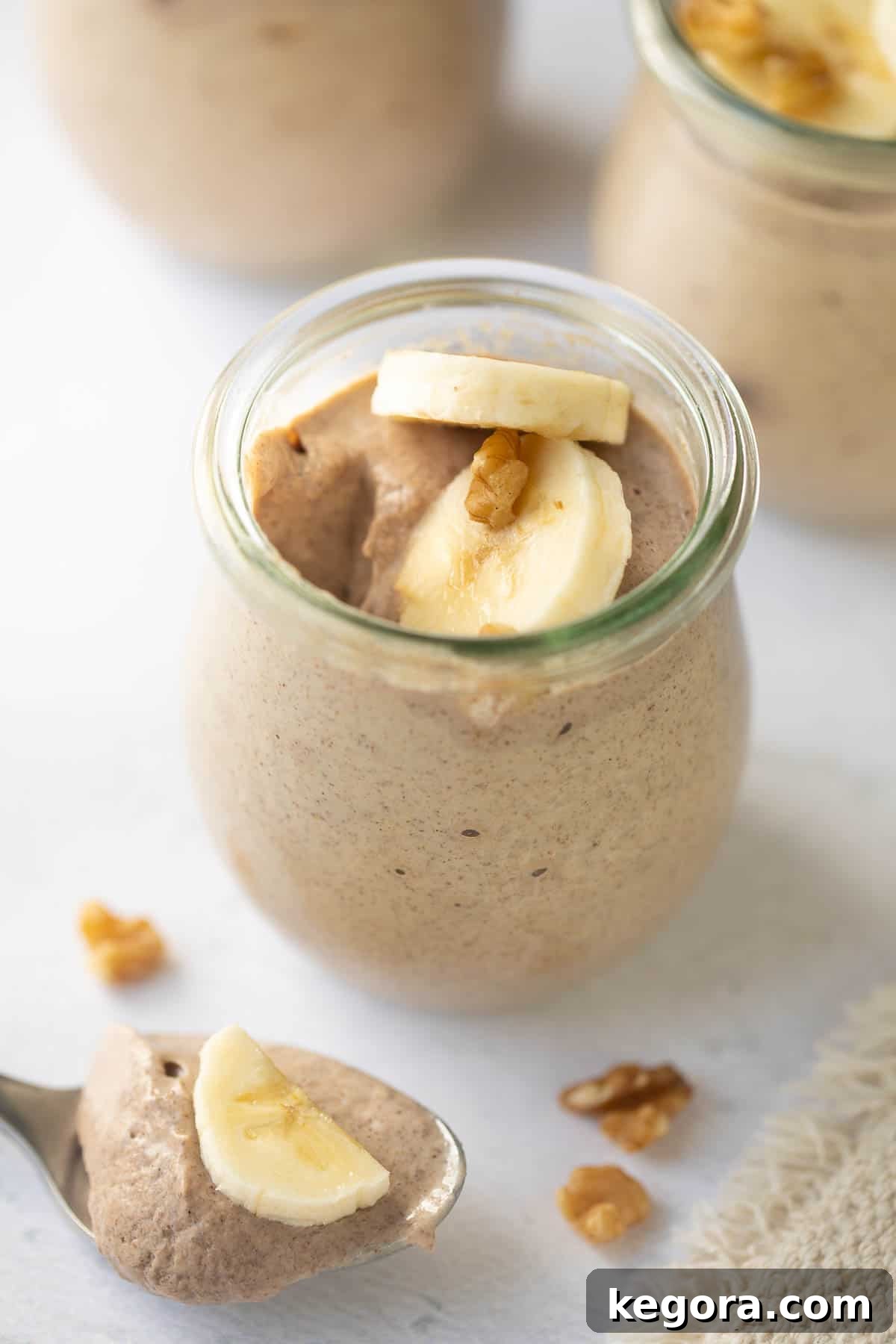Healthy Chia Pudding Serving close up shot of banana chia pudding in a small glass jar, ready to be served