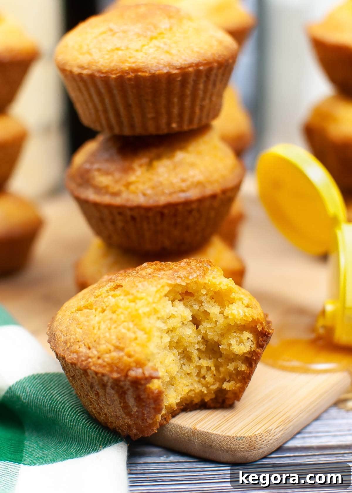 Air Fryer Cornbread Muffins in a stack, perfectly golden brown and inviting
