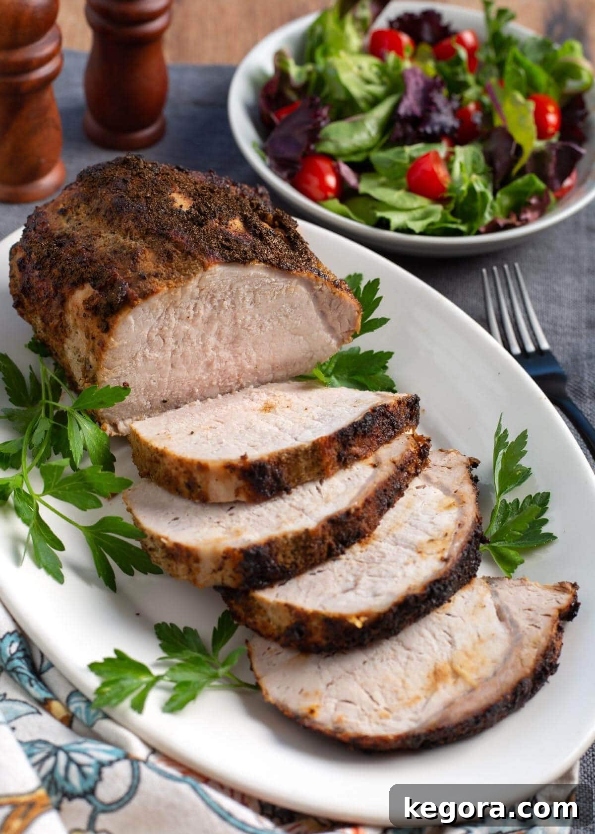 Air Fryer Pork Loin Roast sliced and resting