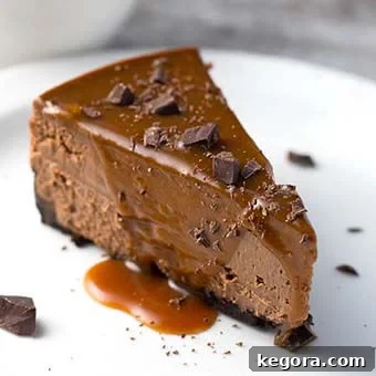 Velvet Orange Pressure Cooker Cheesecake 4 Slice of Instant Pot Chocolate Cheesecake on a white plate
