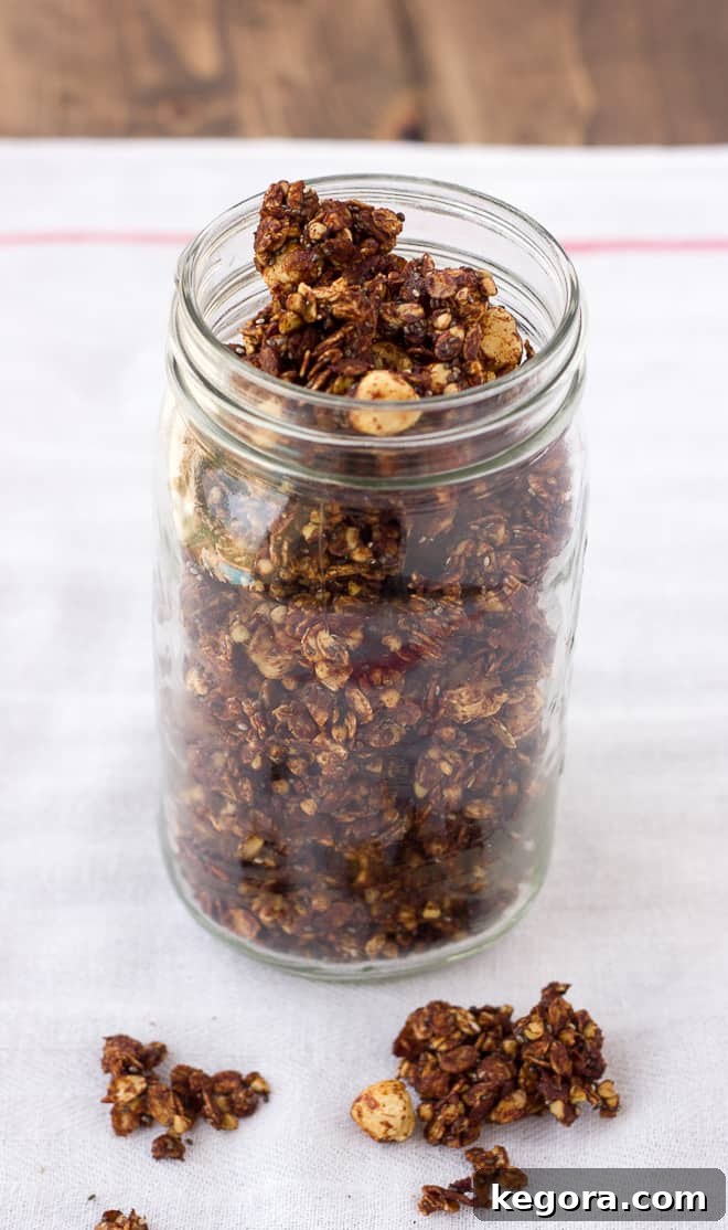 Decadent Chocolate Hazelnut Granola Gluten and Dairy Free 3 Jar of homemade chocolate granola on a white dish towel