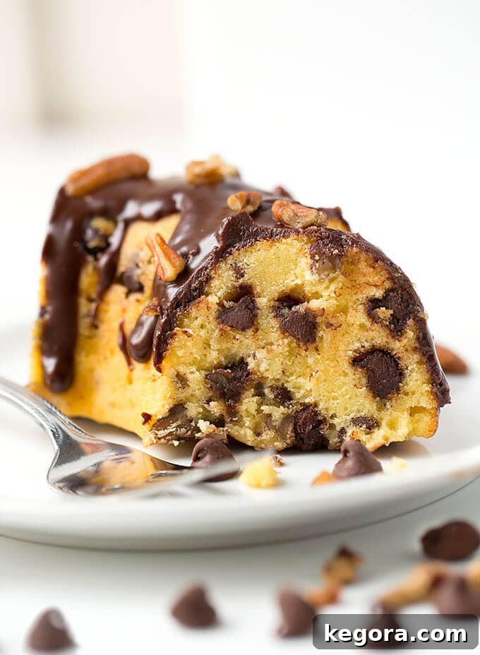 Instant Pot Chocolate Pecan Perfection Cake 3 Slice of Pecan Chocolate Chip Cake on white plate