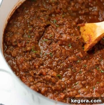 close up shot of gluten free spaghetti sauce in white pot