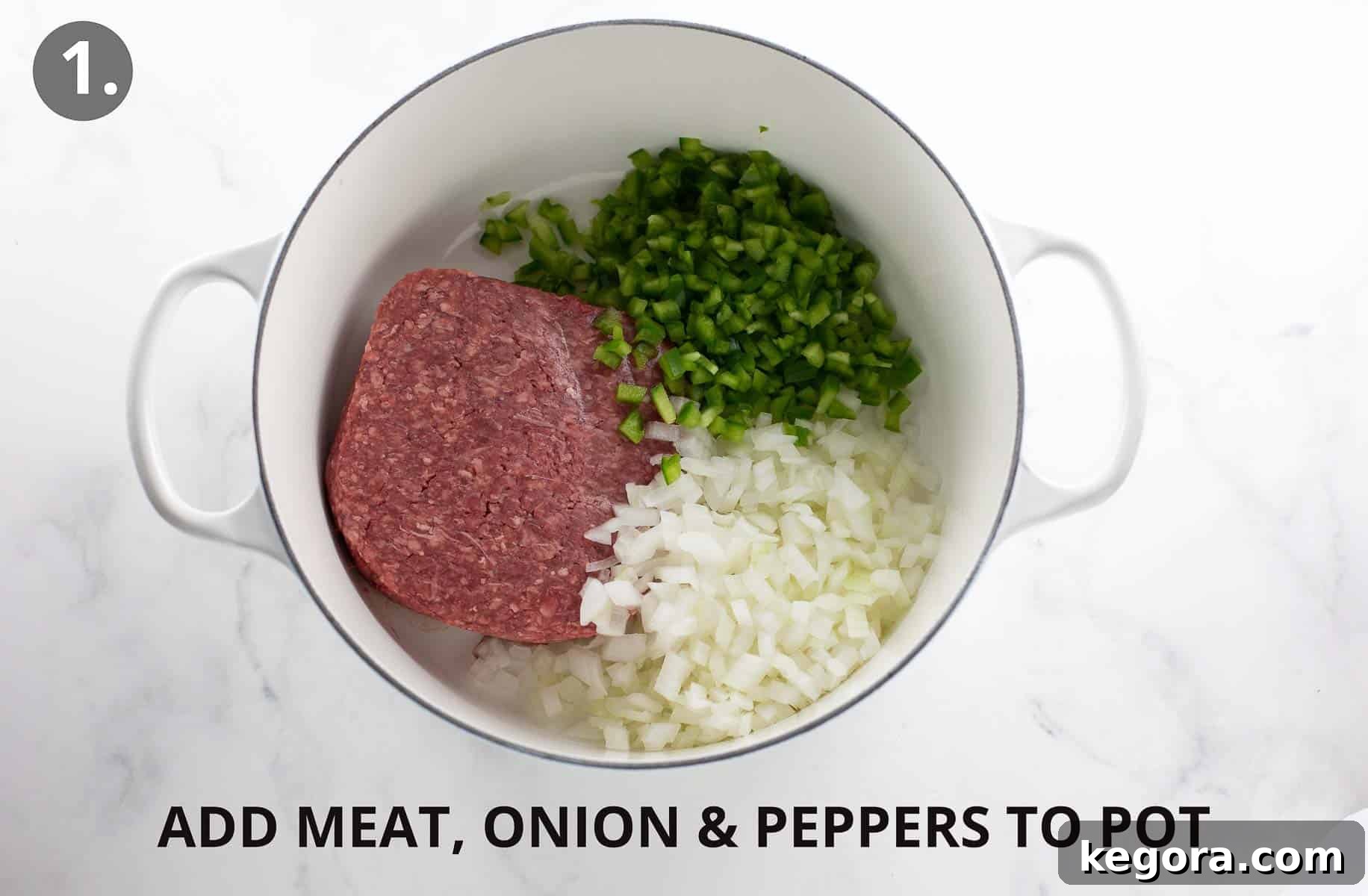 Perfect Gluten-Free Pasta Sauce 5 meat, onion and peppers in white pot.