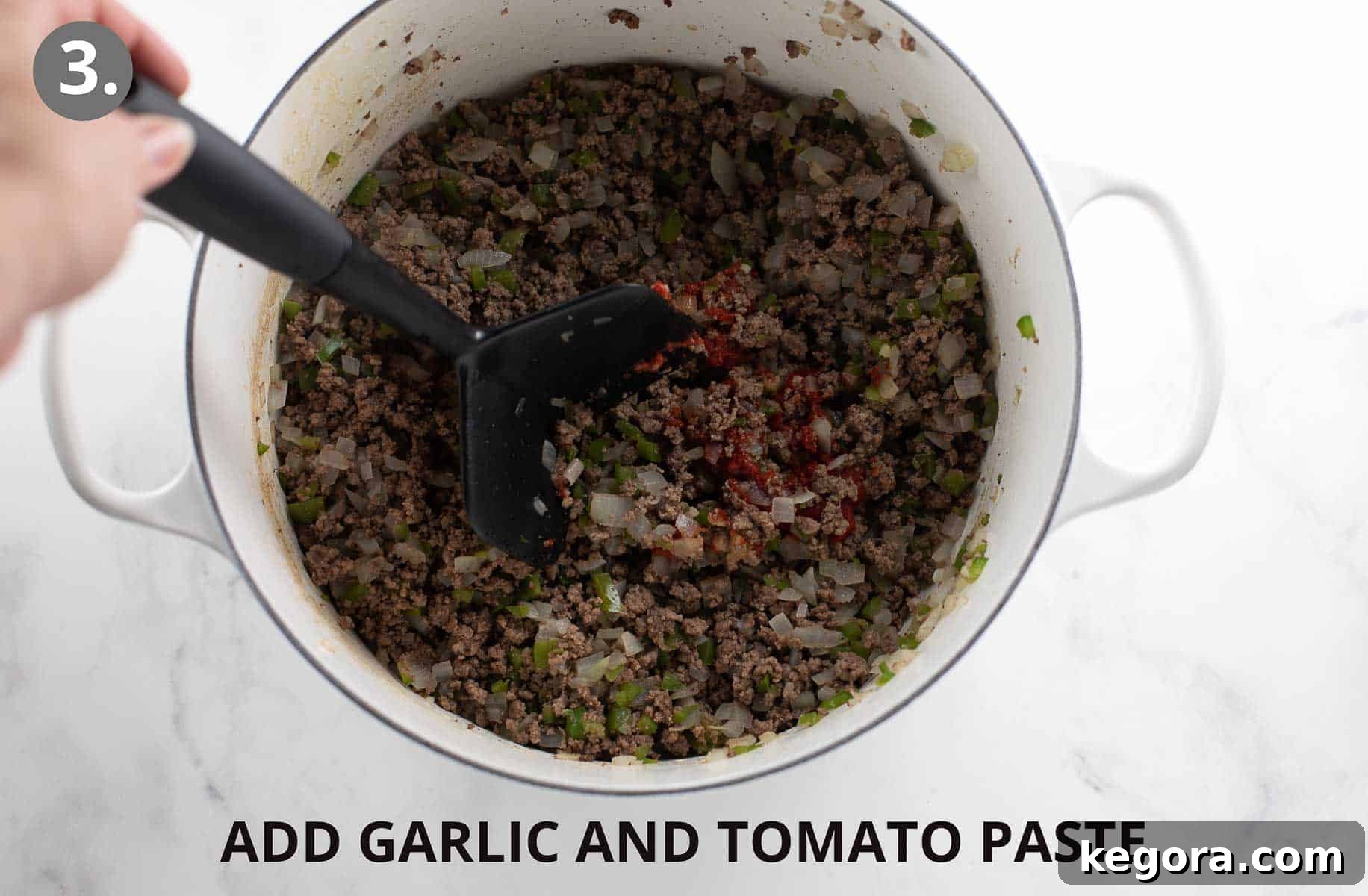 Perfect Gluten-Free Pasta Sauce 7 meat and peppers and onions cooking with garlic and tomato paste.