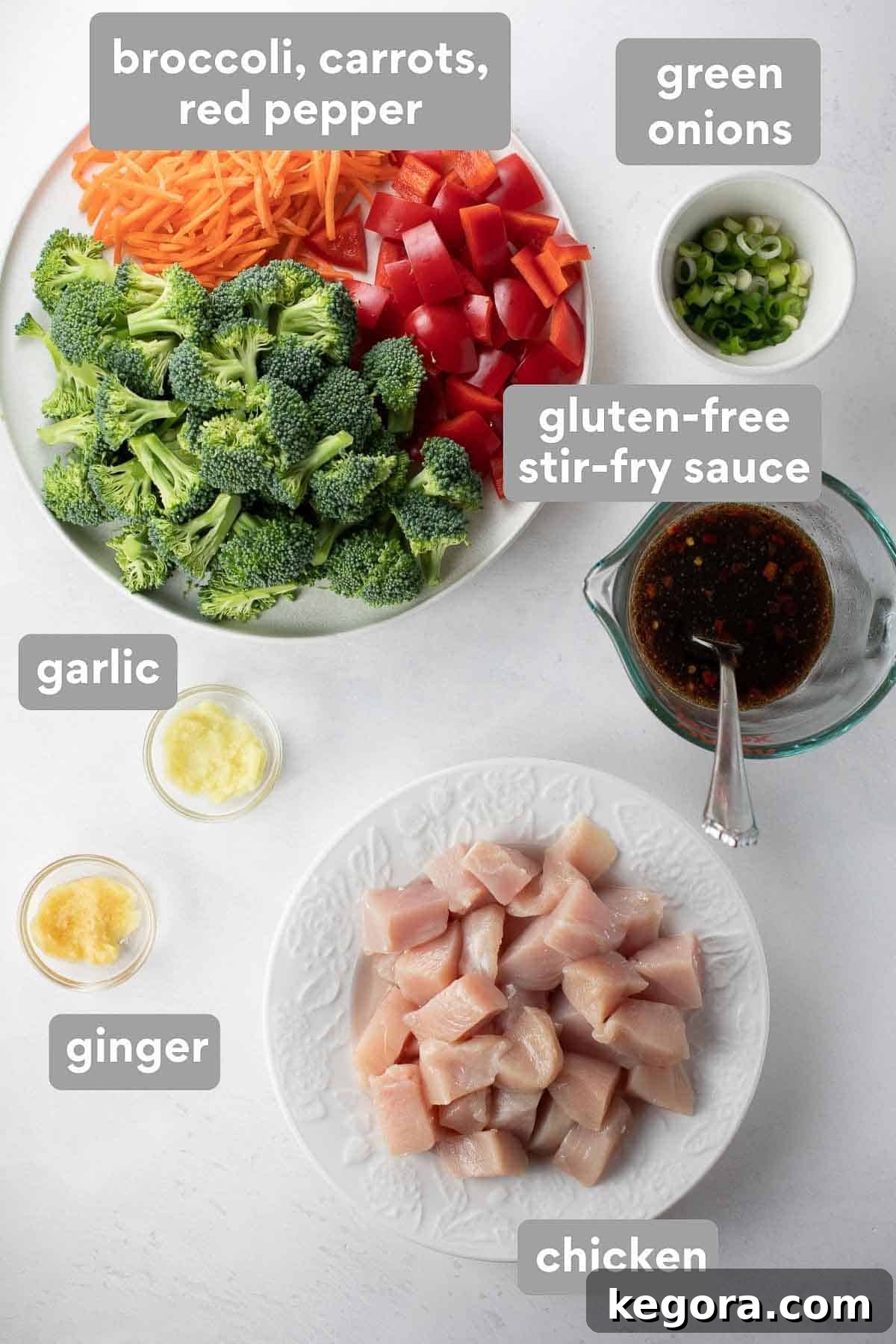 Overhead shot of all the individual ingredients laid out to make a delicious stir fry sauce, including tamari, brown sugar, sesame oil, cornstarch, red pepper flakes, and chicken stock.