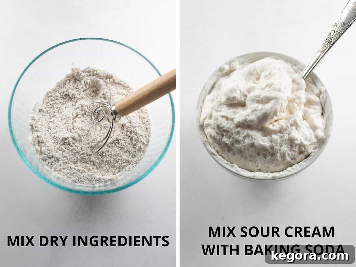 Image showing dry ingredients thoroughly mixed together in one bowl, and sour cream combined with baking soda in a separate small bowl, ready for the next steps in coffee cake preparation.