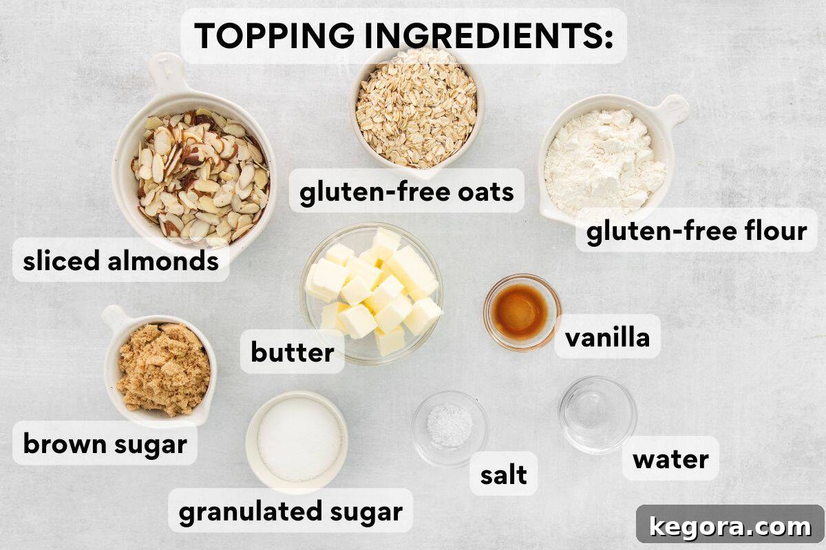 Crisp topping ingredients, including gluten-free oats, sliced almonds, gluten-free flour, brown sugar, granulated sugar, vanilla extract, water, and kosher salt, neatly arranged on a counter.