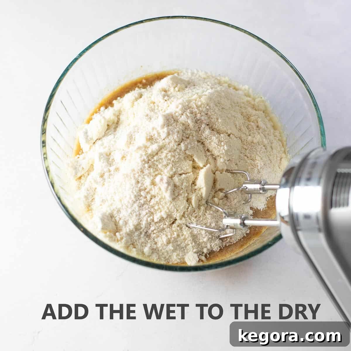 Titled photo of step-by-step recipe instructions for banana bread: "add the wet to the dry"