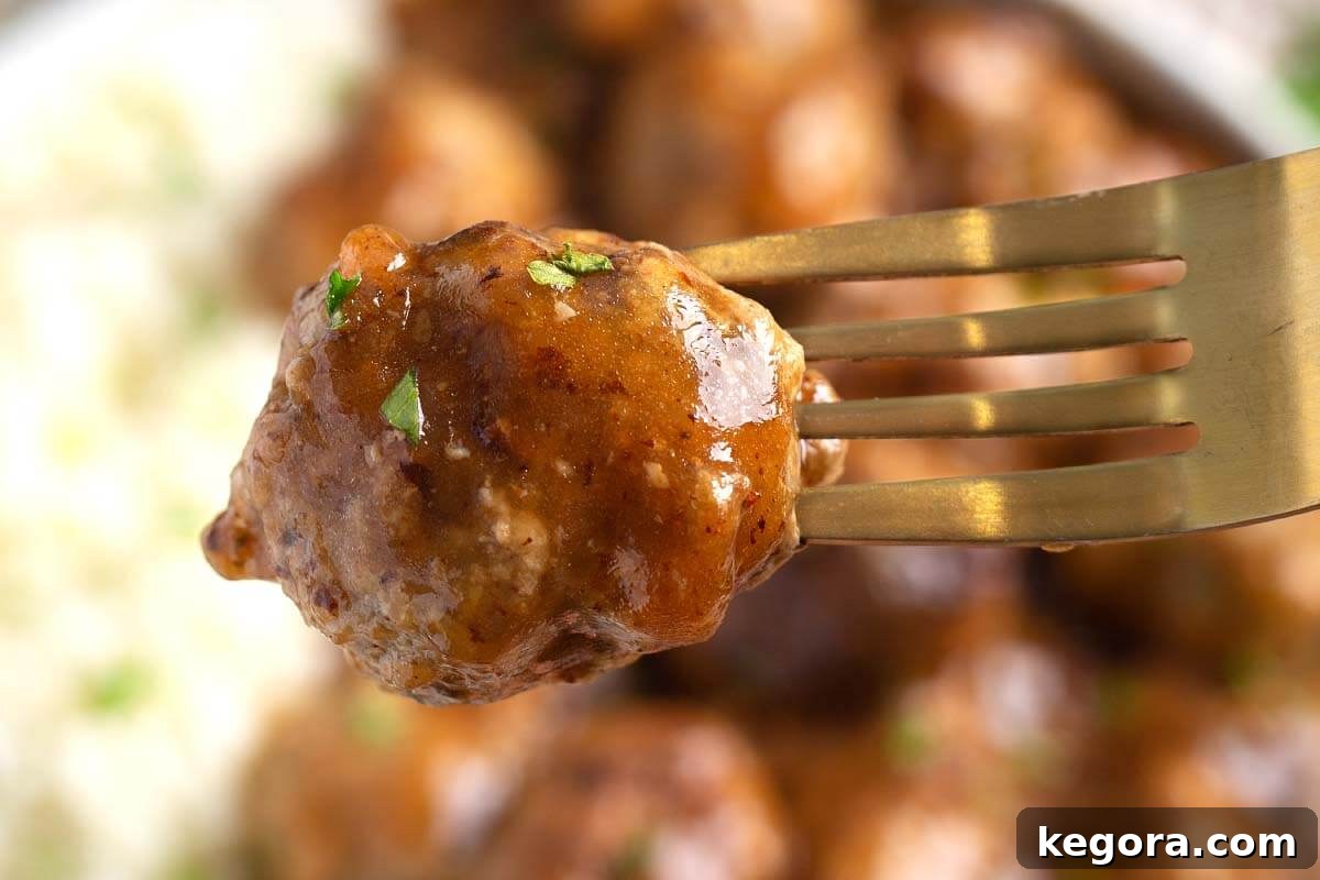 Turkey Meatballs on a fork.