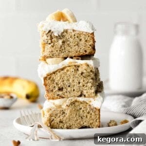 Golden Gluten-Free Banana Treat 8 Stack of gluten-free banana cake slices with cream cheese frosting.
