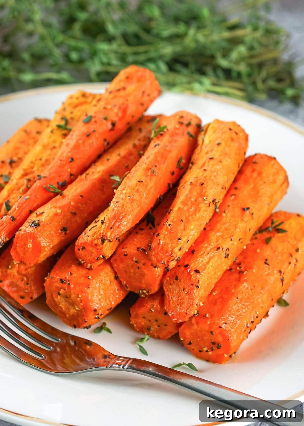 Crispy Air Fryer Carrots 2 Air Fryer Carrots on plate.
