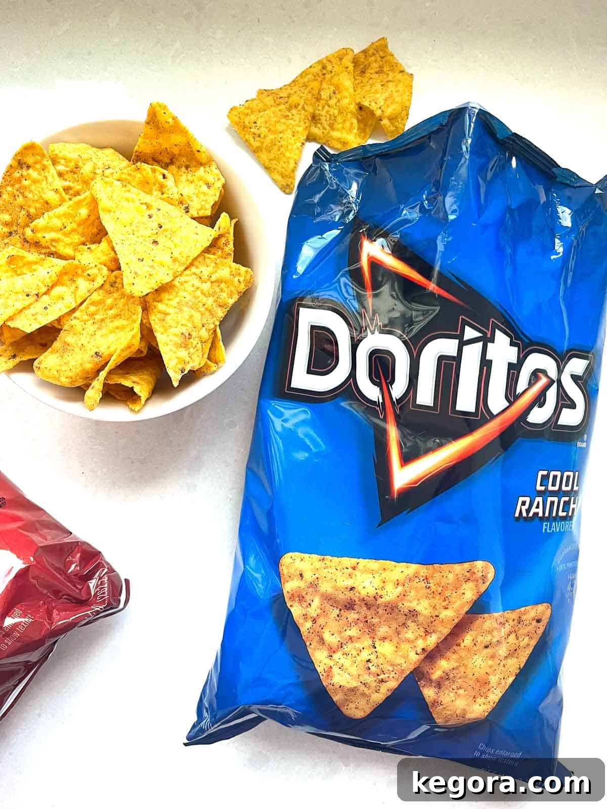 The Gluten-Free Truth About Doritos 4 bag of cool ranch doritos open on white counter