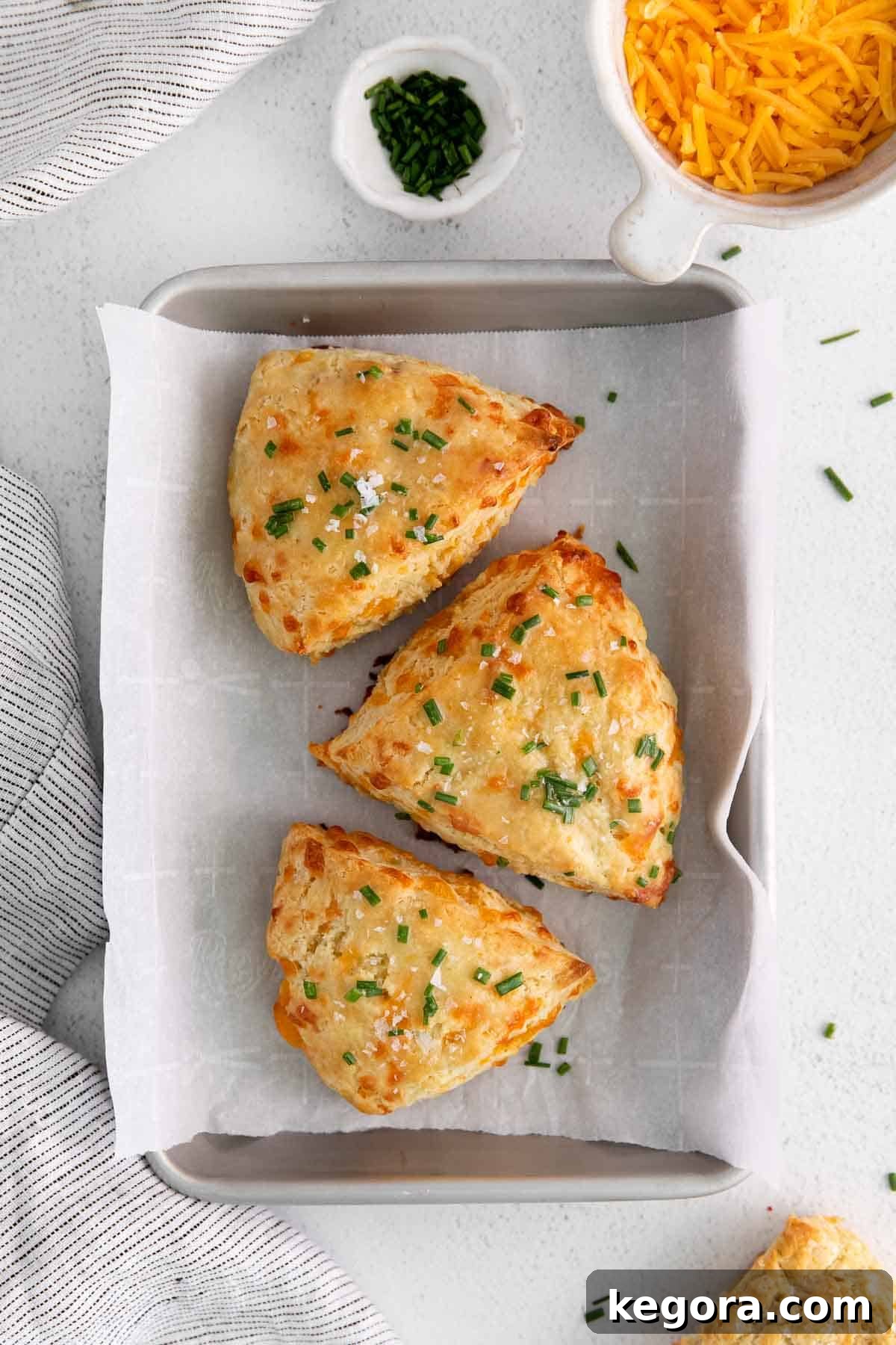 Fluffy Gluten-Free Cheese Scones 8 Gluten-free cheese scone dough shaped into a round and ready to be cut into wedges.
