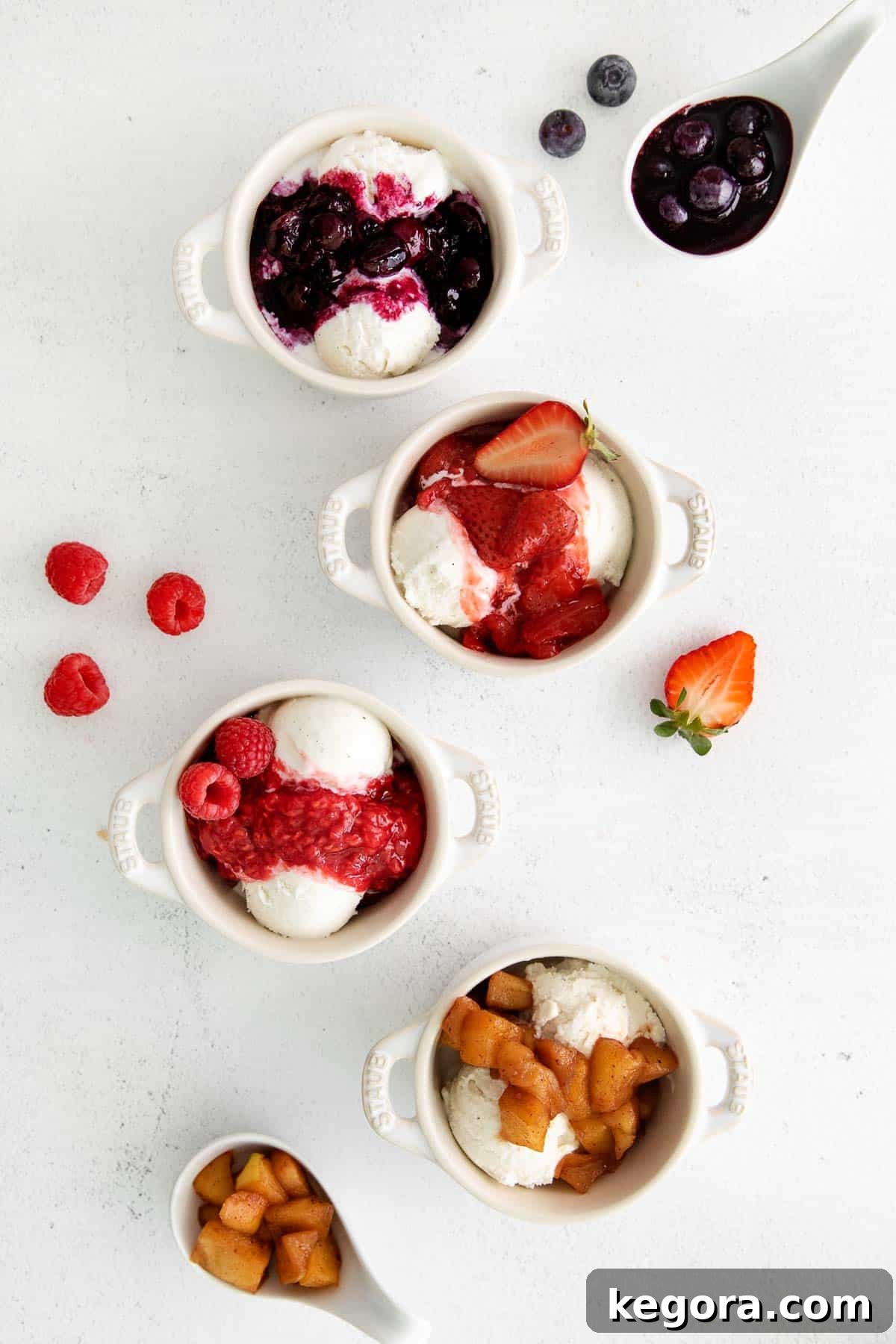 Crafting Delicious Fruit Compote from Scratch 2 Four ramekins filled with vanilla ice cream and topped with different types of fruit compote