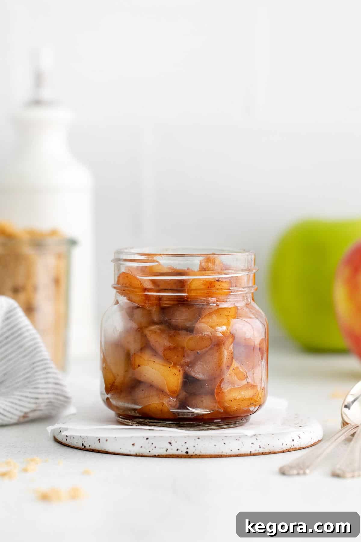 Crafting Delicious Fruit Compote from Scratch 7 A jar of apple compote on a countertop