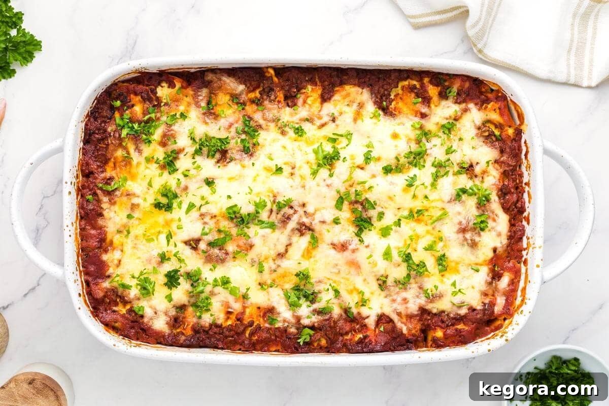Baked Ravioli Lasagna in a baking dish, golden and bubbly.