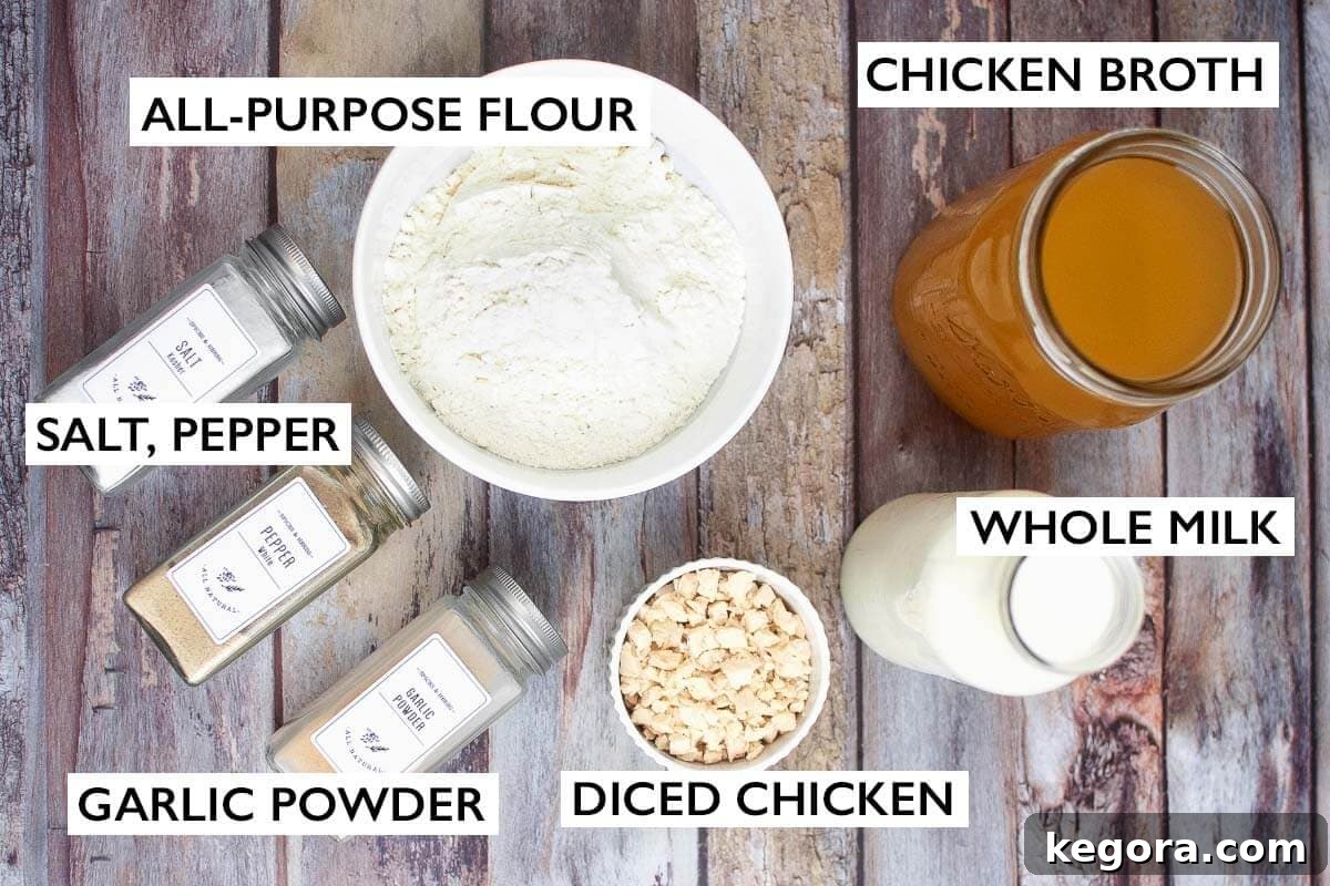 Condensed Cream of Chicken Soup ingredients shot with broth, milk, flour, and diced chicken.
