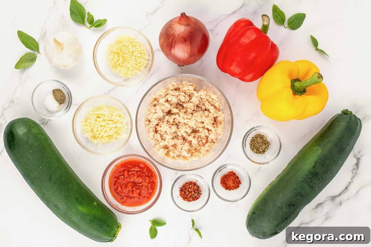 A vibrant display of fresh ingredients for Stuffed Zucchini Boats, including zucchini, bell peppers, cheese, and spices.