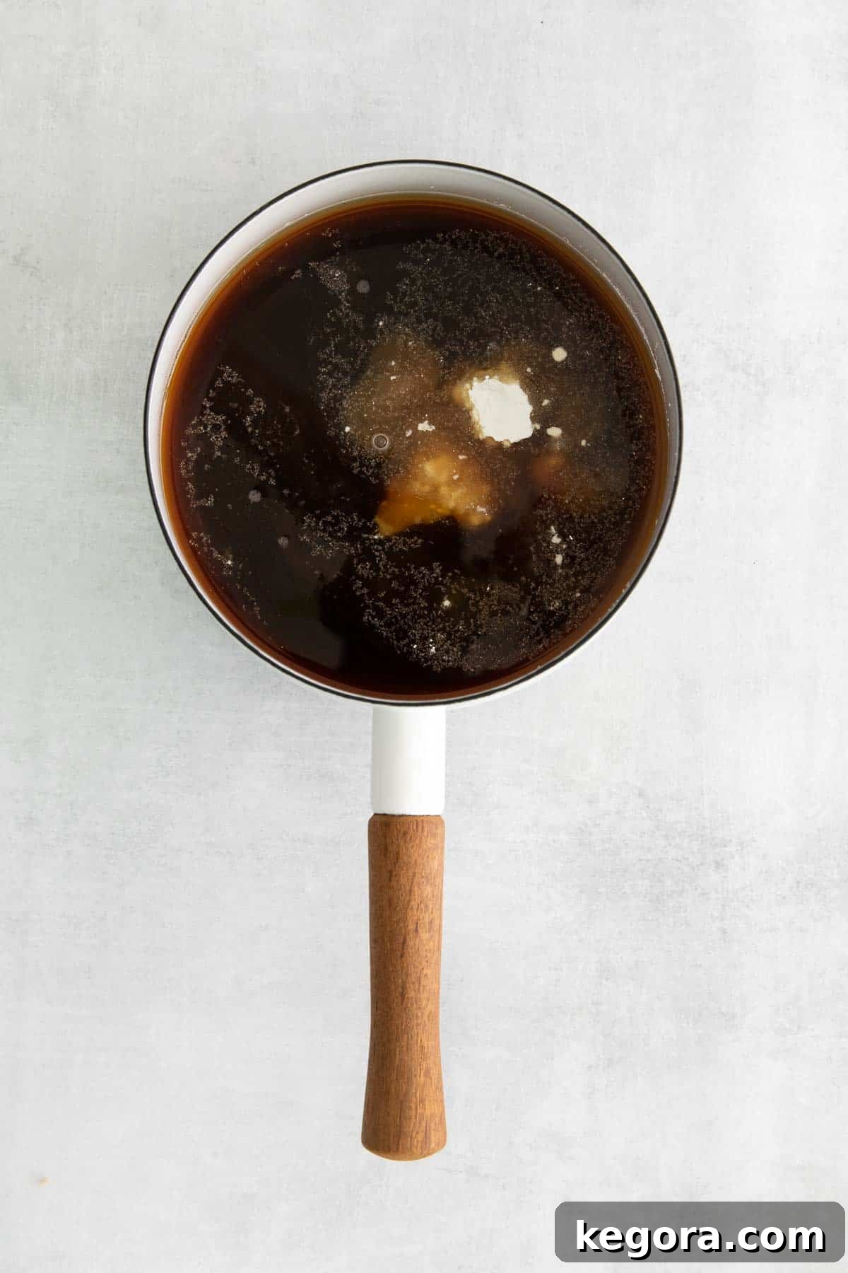 Ingredients for gluten-free teriyaki sauce in a saucepan, not yet mixed