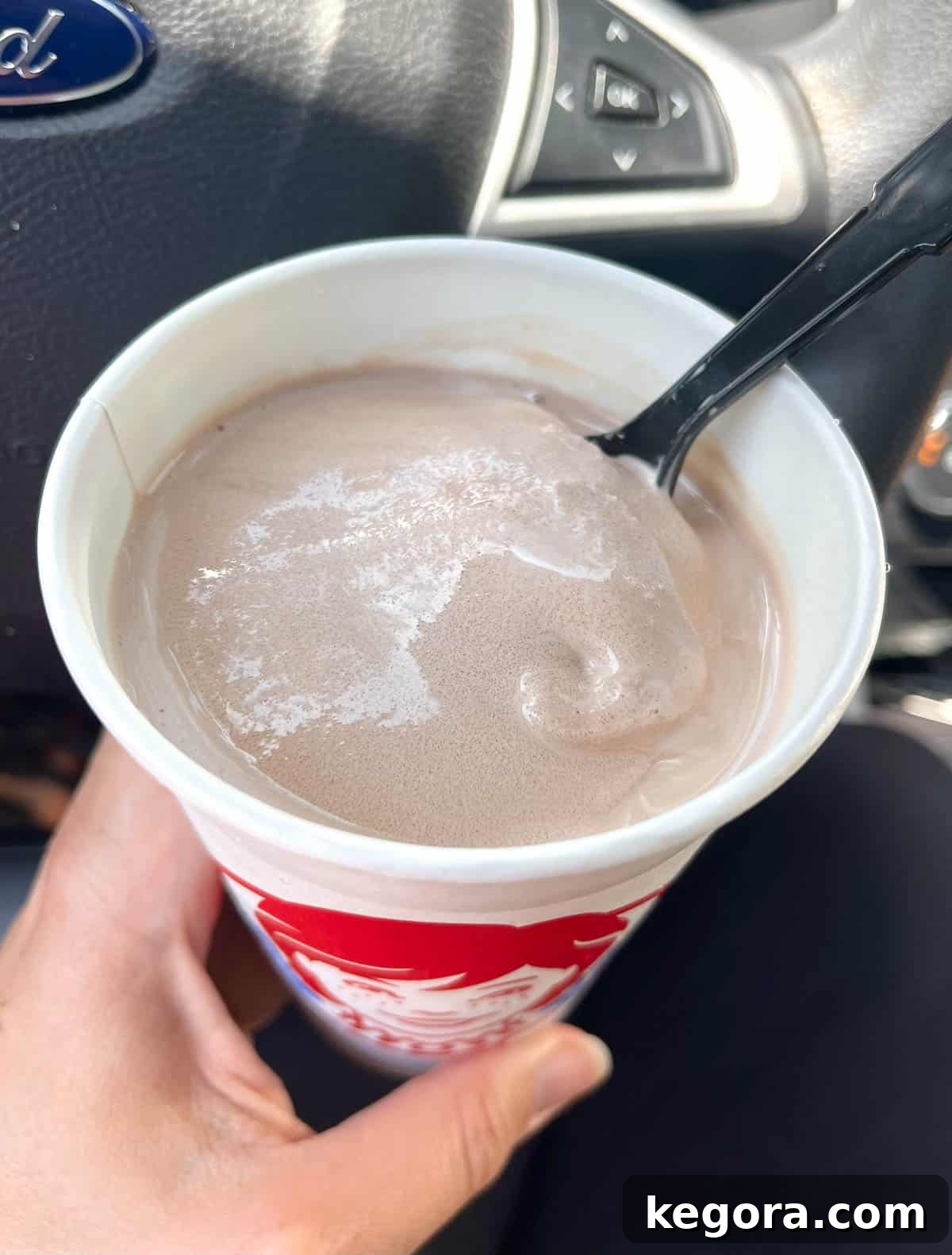 Wendy's Frosty with a spoon in it