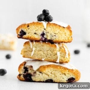 blueberry scones stacked on top of each other on a countertop
