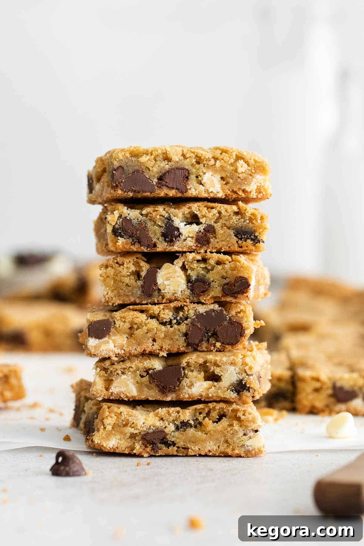A beautifully arranged stack of gluten-free blondies on a countertop, showcasing their inviting golden color and appealing texture.