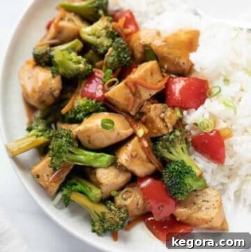 gluten free stir fry on plate with white rice