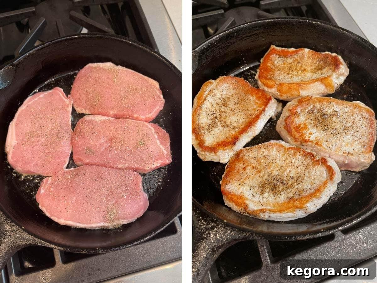 Four pork chops searing in a cast iron skillet over medium-high heat.