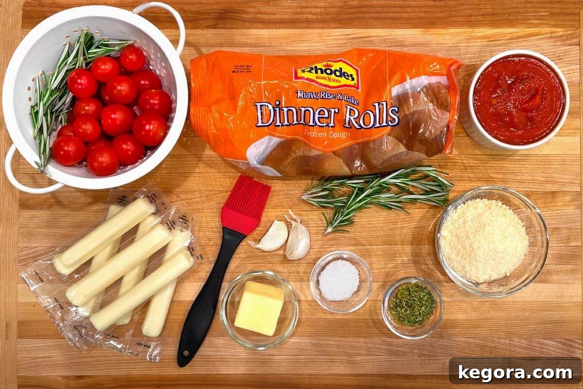 Dinner Roll Christmas Tree Appetizer ingredients shot on a board.