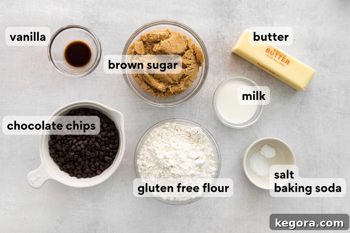 Guiltless Gluten-Free Cookie Dough Cravings 4 A selection of fresh, high-quality ingredients for gluten-free edible cookie dough, including flour, sugar, butter, and chocolate chips, neatly arranged on a countertop.