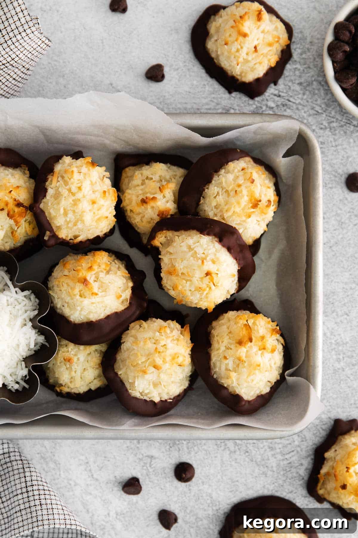 Golden Coconut Cloud Cookies 3 Pile of golden gluten-free coconut macaroons in a baking dish