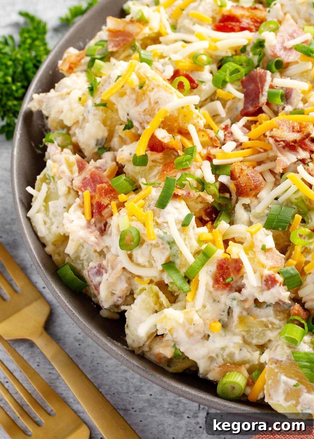 Creamy Bacon Cheddar Potato Salad 2 Loaded Potato Salad in a bowl closeup