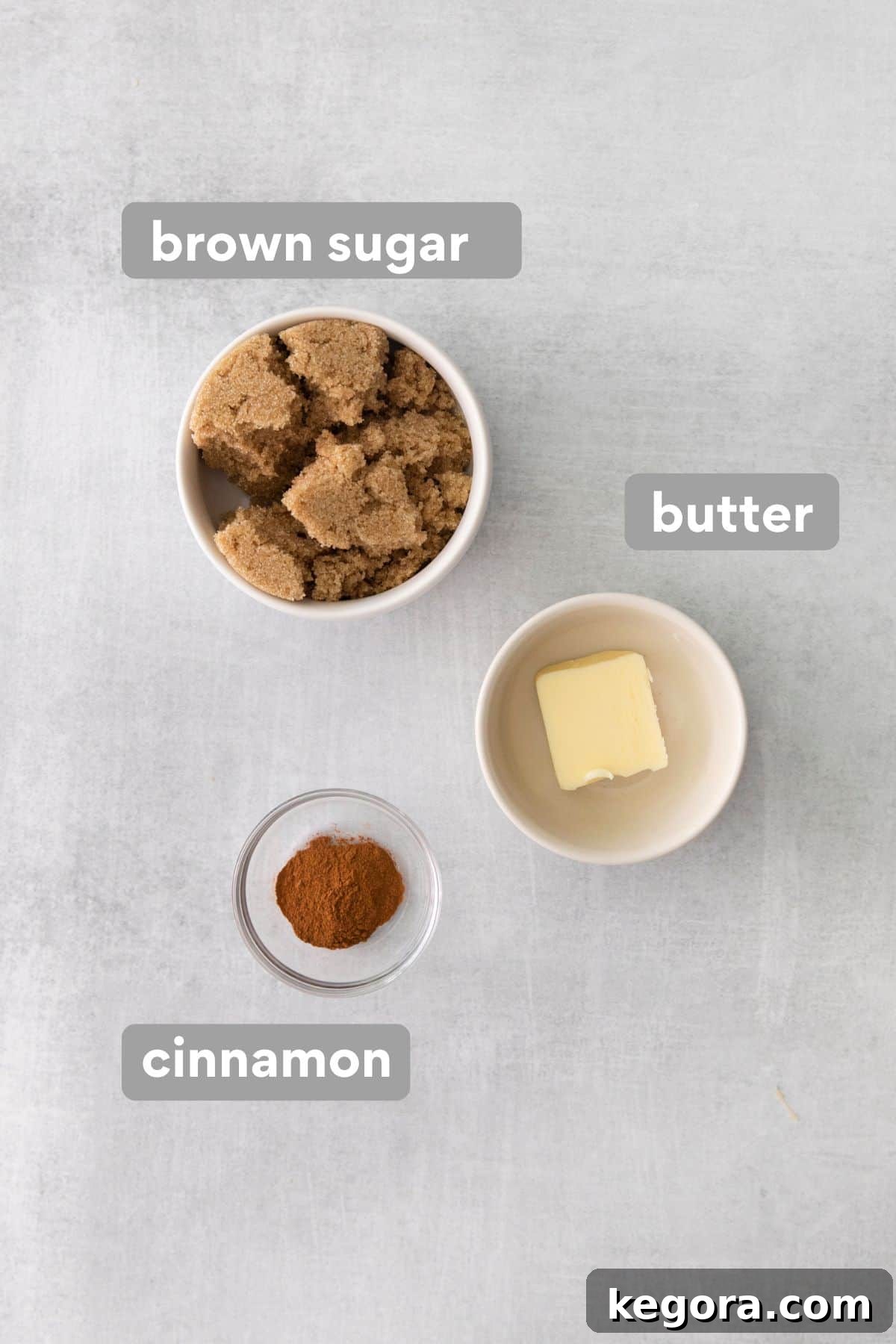 Homestyle Gluten-Free Apple Cake 5 Ingredients for the apple cake crumble topping, including brown sugar, butter, and cinnamon, arranged on a counter.