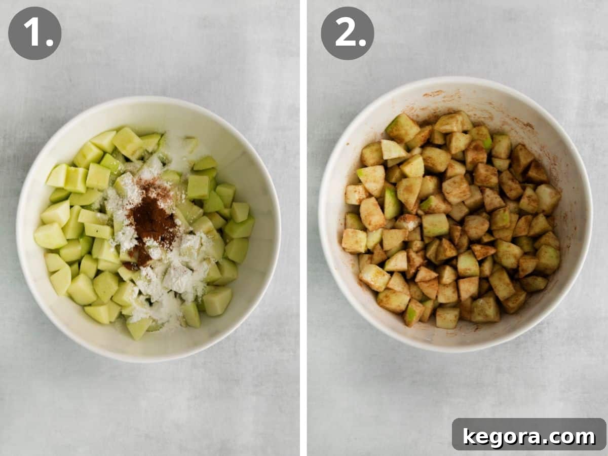 Apple chunks in a bowl with spices poured on top, and a bowl with the apple chunks and spices mixed together
