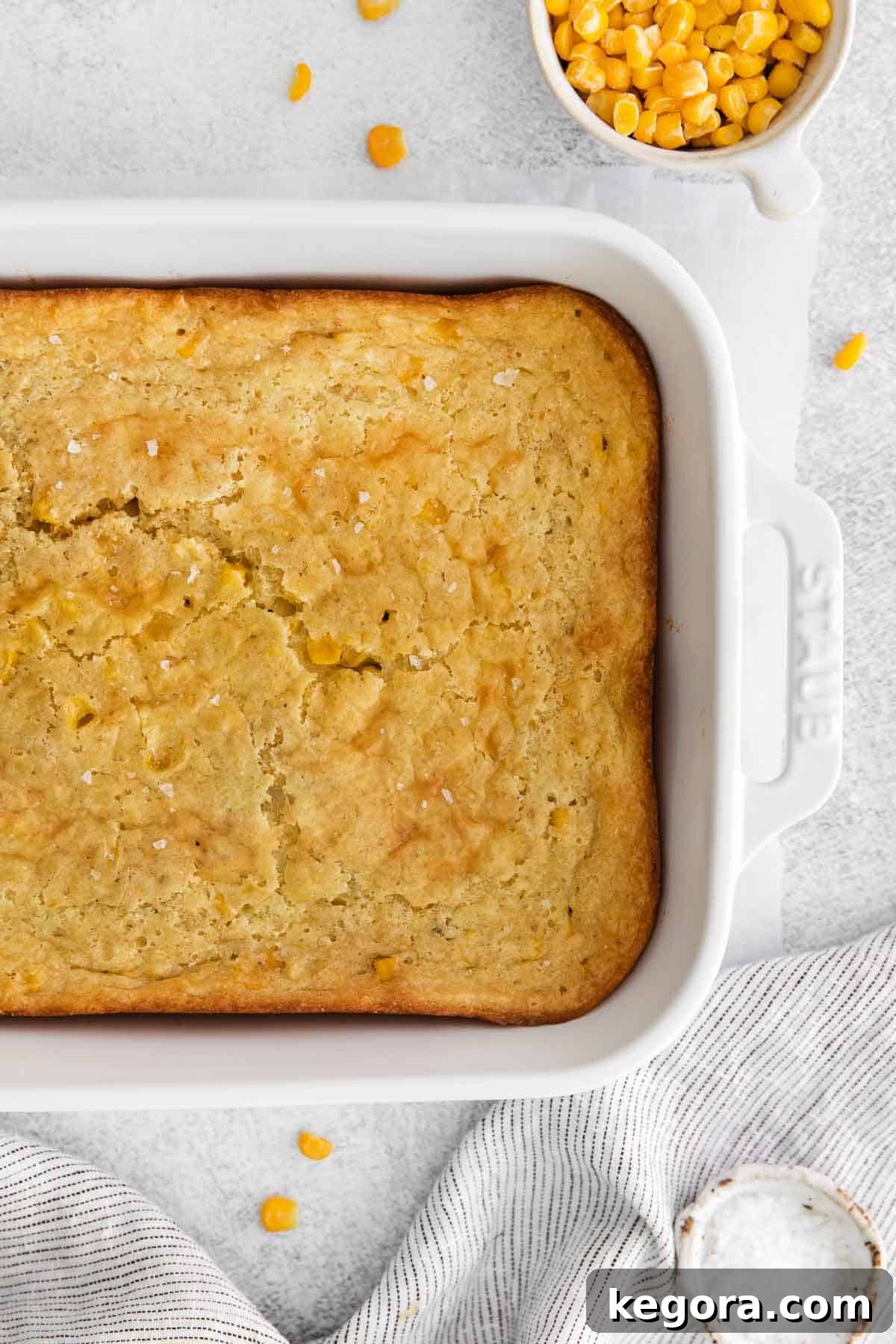 Creamy Gluten-Free Corn Bake 11 An enticing overhead shot of the baked gluten-free corn casserole, showcasing its golden crust and creamy texture in a baking dish, ready to be portioned