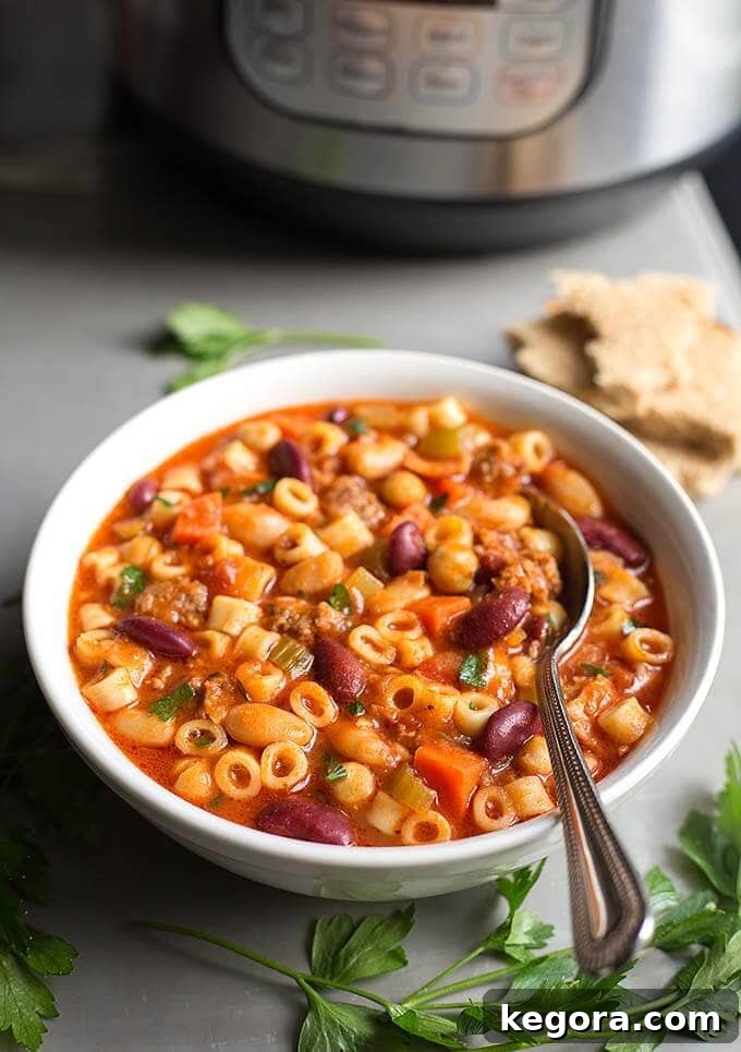 Hearty Instant Pot Pasta e Fagioli 4 Pasta E Fagioli in a white bowl in front of the IP