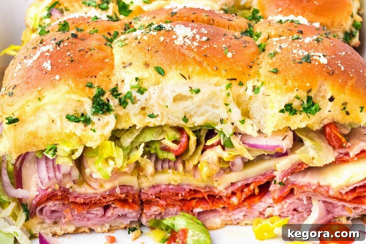 Italian Sub Sliders super closeup, showing melted cheese and vibrant fillings