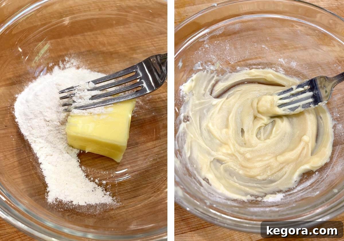 Flour and butter being mixed together in a small bowl to create a smooth roux, the base for the rich gravy.