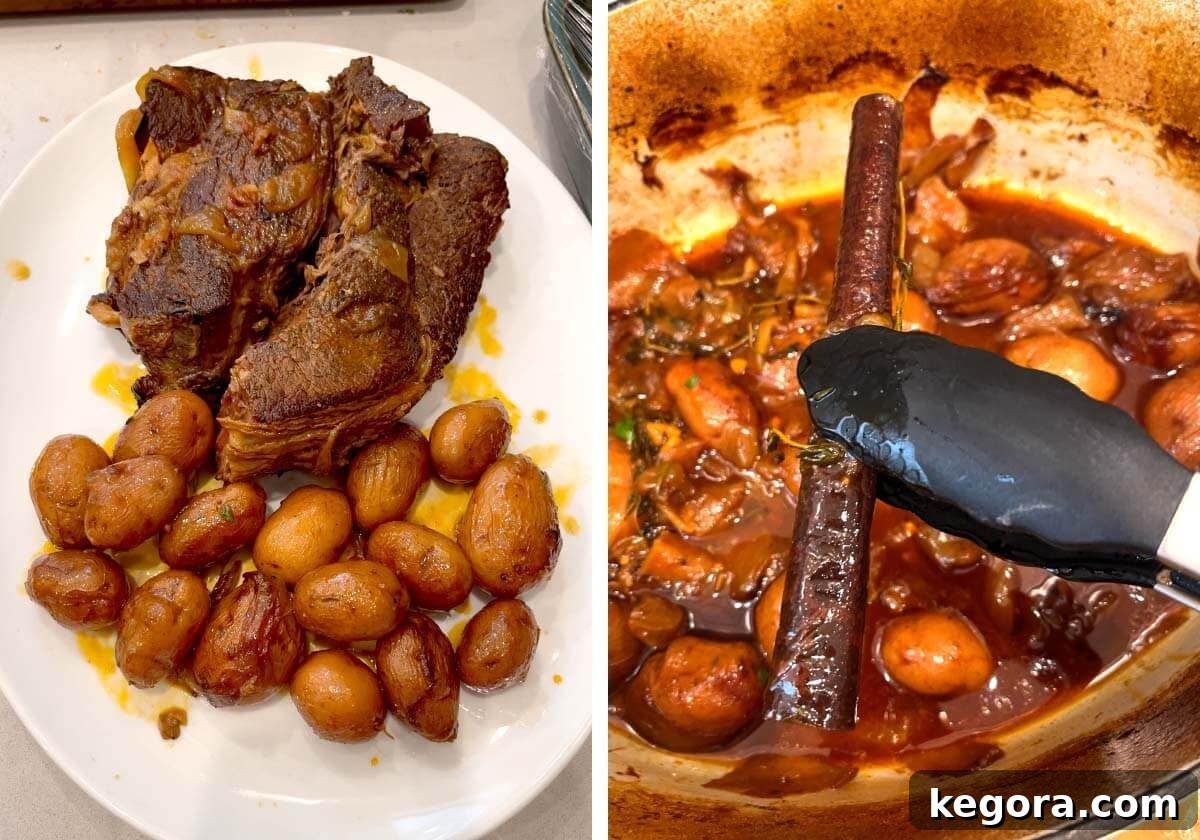 The cooked roast and vegetables on a plate, with the cinnamon stick being removed from the flavorful braising liquid in the pot.