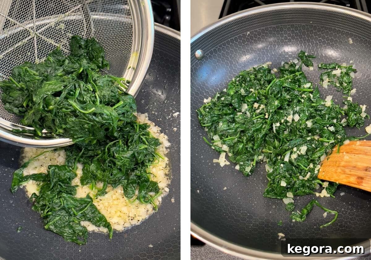 Rich Creamy Cheesy Spinach 8 Drained spinach being added back into the skillet with sautéed onions and garlic, then stirred to combine.