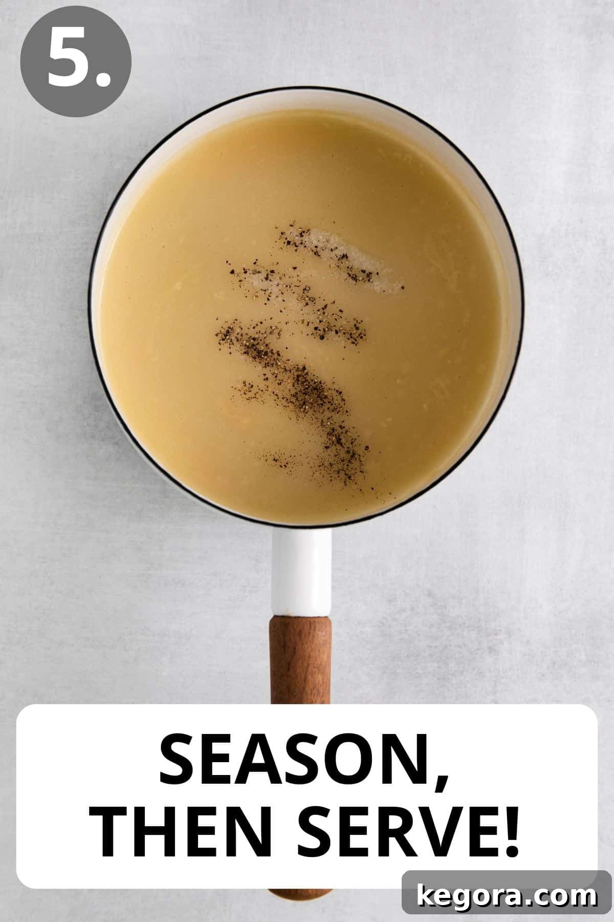 A close-up shot of a pot of thick, bubbling gluten-free gravy, ready to be seasoned.