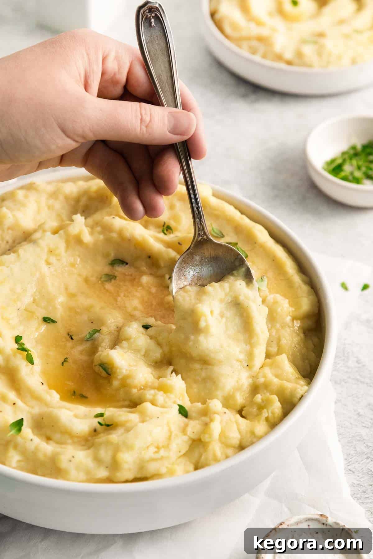 Velvety Dairy-Free Mashed Potatoes 10 Large serving of creamy dairy-free mashed potatoes in a bowl, ready to eat.