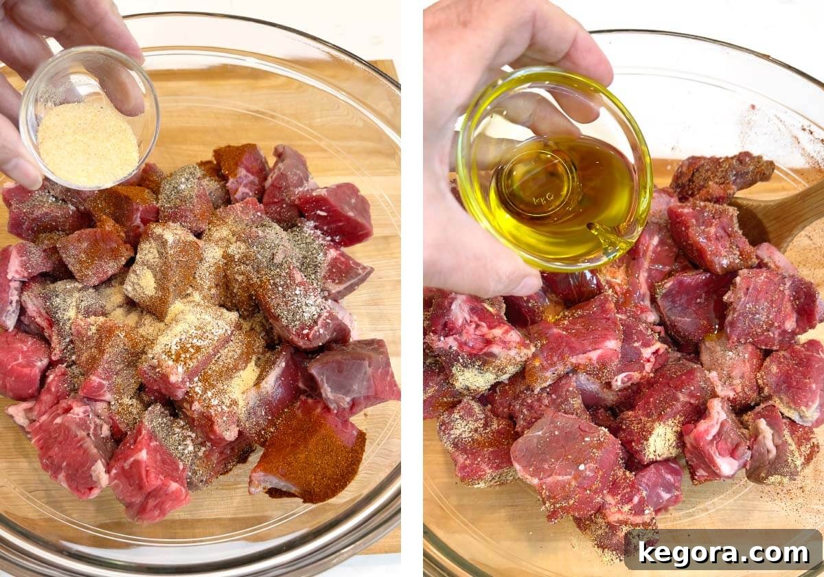 Melt-in-Your-Mouth Slow Cooker Garlic Butter Steak Bites 5 adding seasonings and olive oil to beef cubes