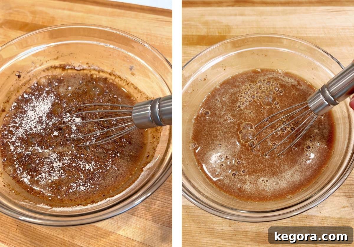 Melt-in-Your-Mouth Slow Cooker Garlic Butter Steak Bites 9 whisking au jus with beef broth