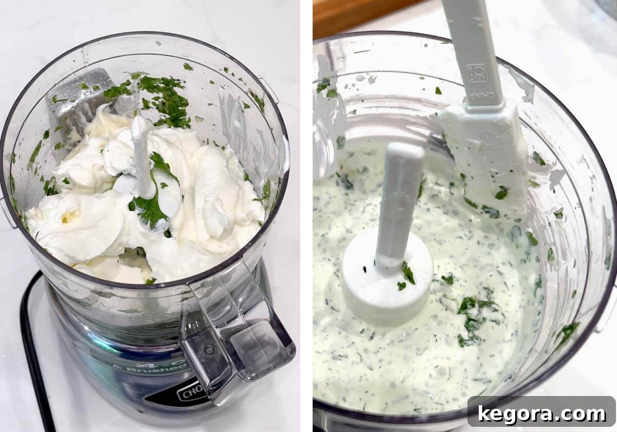 Vibrant Cilantro Cream 7 Sour cream and mayonnaise being added to the finely chopped cilantro and spice mixture in a food processor bowl